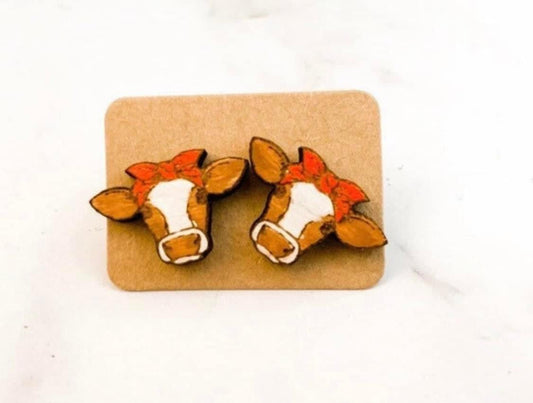 Brown and white cow bow studs