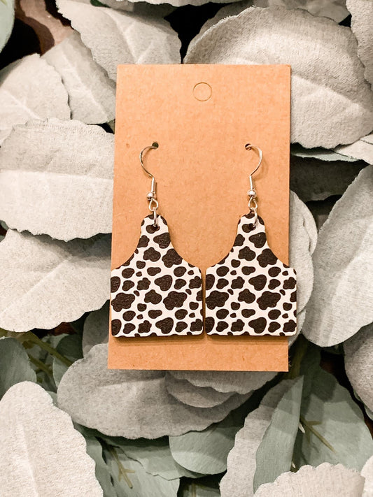 Cow print dangles